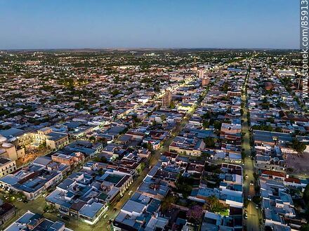 Vista aérea de la ciudad de Paysandú al atardecer - Departamento de Paysandú - URUGUAY. Foto No. 85913