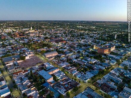Aerial view of the city of Paysandú at sunset. - Department of Paysandú - URUGUAY. Photo #85918