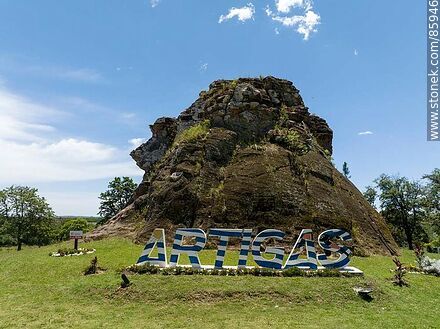 Aerial view of the Piedra Pintada. Artigas sign at the foot of the stone - Artigas - URUGUAY. Photo #85946