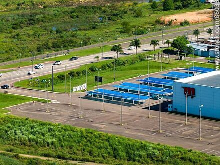 Aerial view of Macromercado's parking lot - Department of Rivera - URUGUAY. Photo #86038
