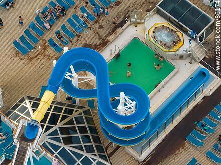 Aerial view of deck areas of the Costa Favolosa cruise ship. Slide to the pool - Department of Montevideo - URUGUAY. Photo #86174