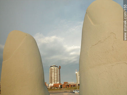 Torreon Tower between two fingers. - Punta del Este and its near resorts - URUGUAY. Photo #155